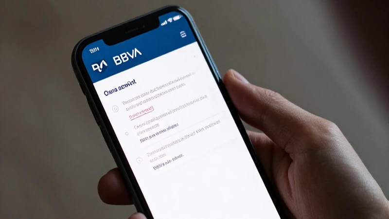 Teléfono muestra la aplicación BBVA a la luz suave.