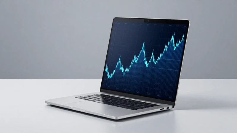 Portátil en gráfico financiero, luz suave